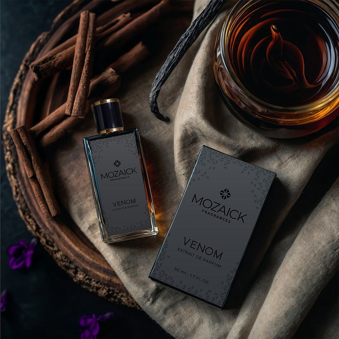 VENOM Extrait de Parfum 50 ml by MOZAICK – bottle and box on linen with cinnamon sticks, a vanilla pod and a glass